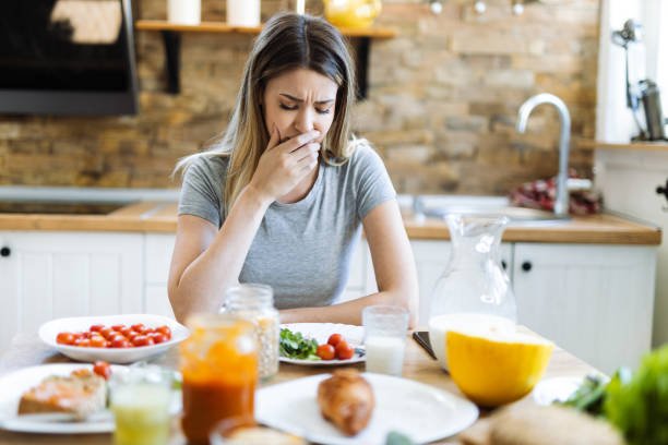 A woman having food aversion during pregnancy