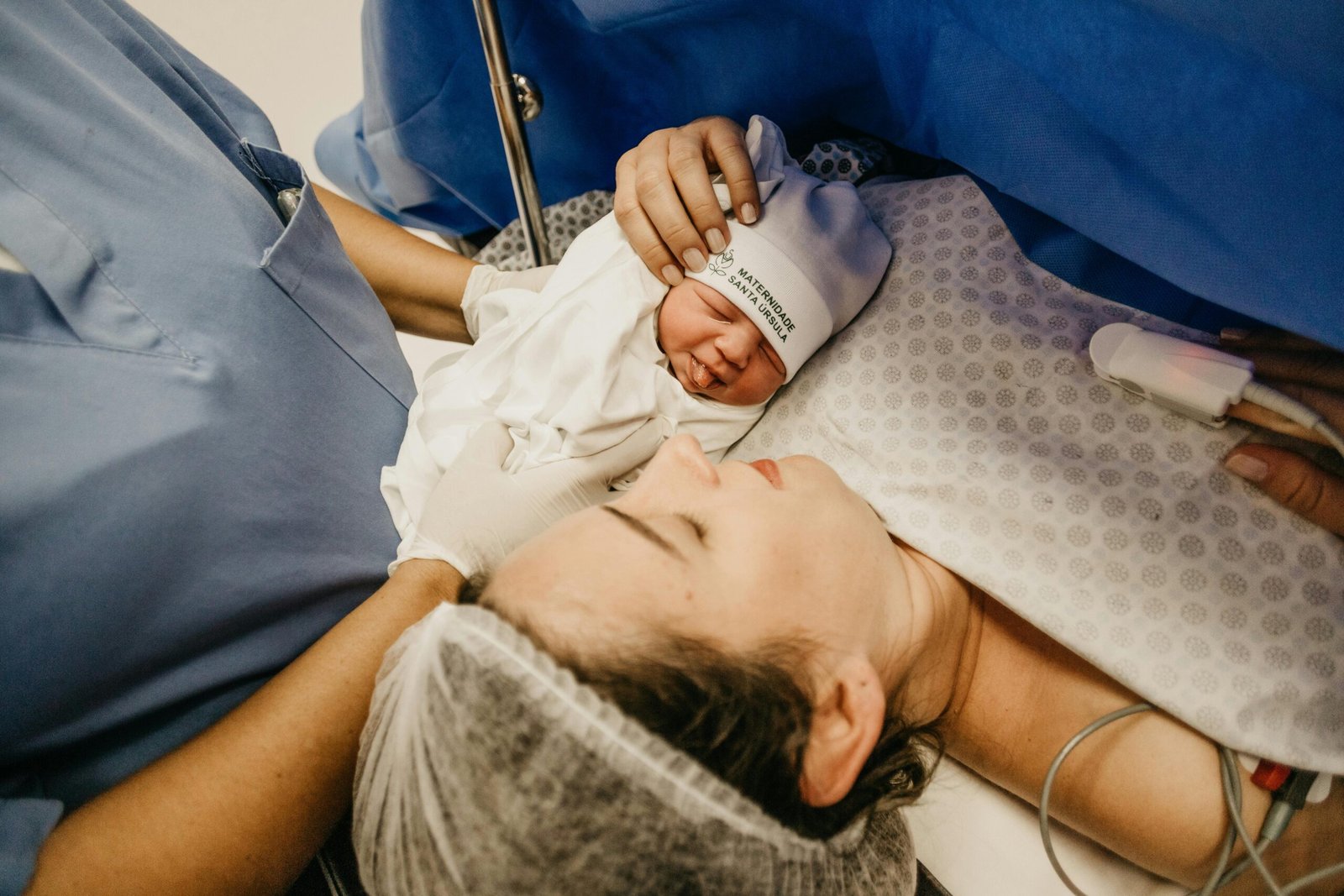 A woman who just gave birth in the delivery room