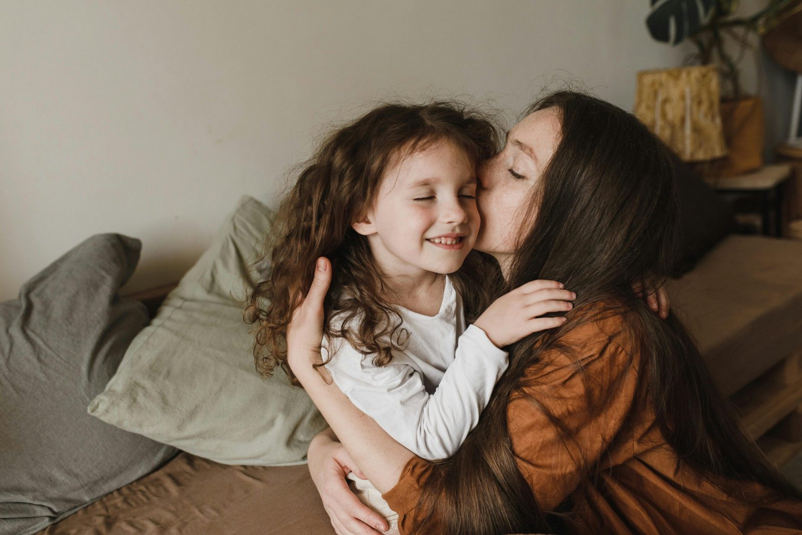 A mother practicing gentle parenting over permissive parenting