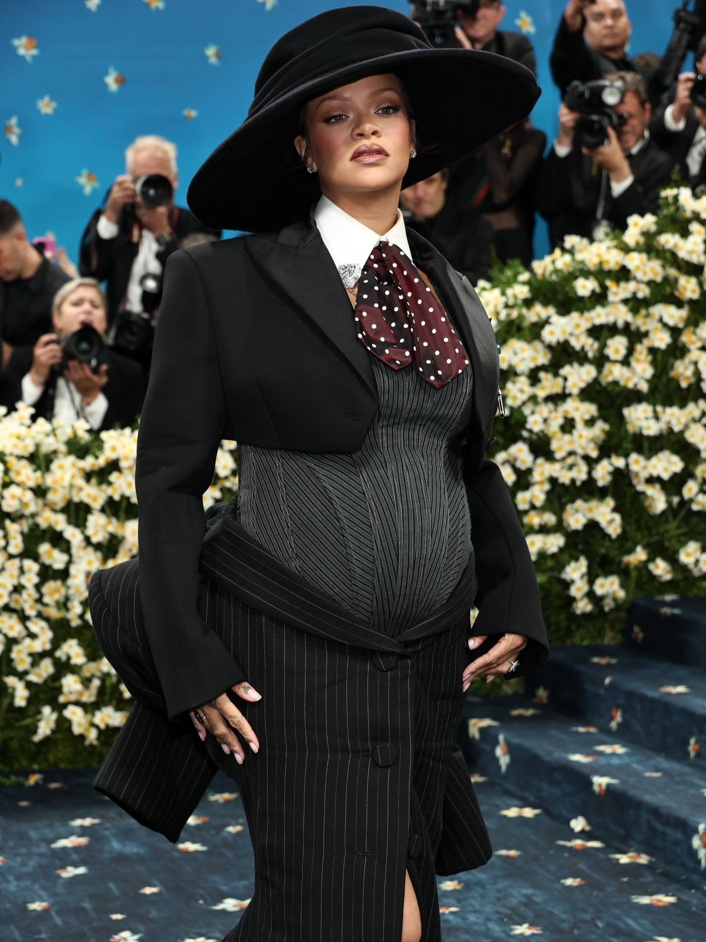 Rihanna's pregnant Met Gala look Rihanna shows up with her third child in her belly to the 2025 Met Gala
